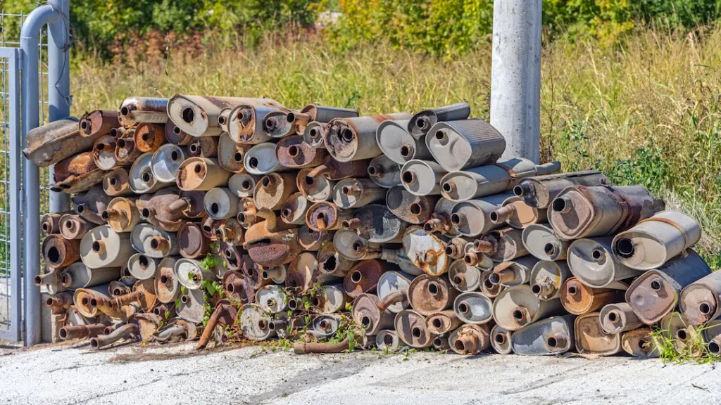 Catalytic Converters piled up in a scrapyard